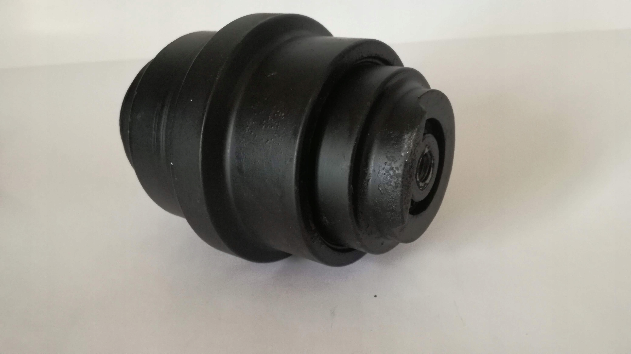 332/V6055 - Нижний ходовой ролик JCB 1.5 T MINI 801 332 / V6055