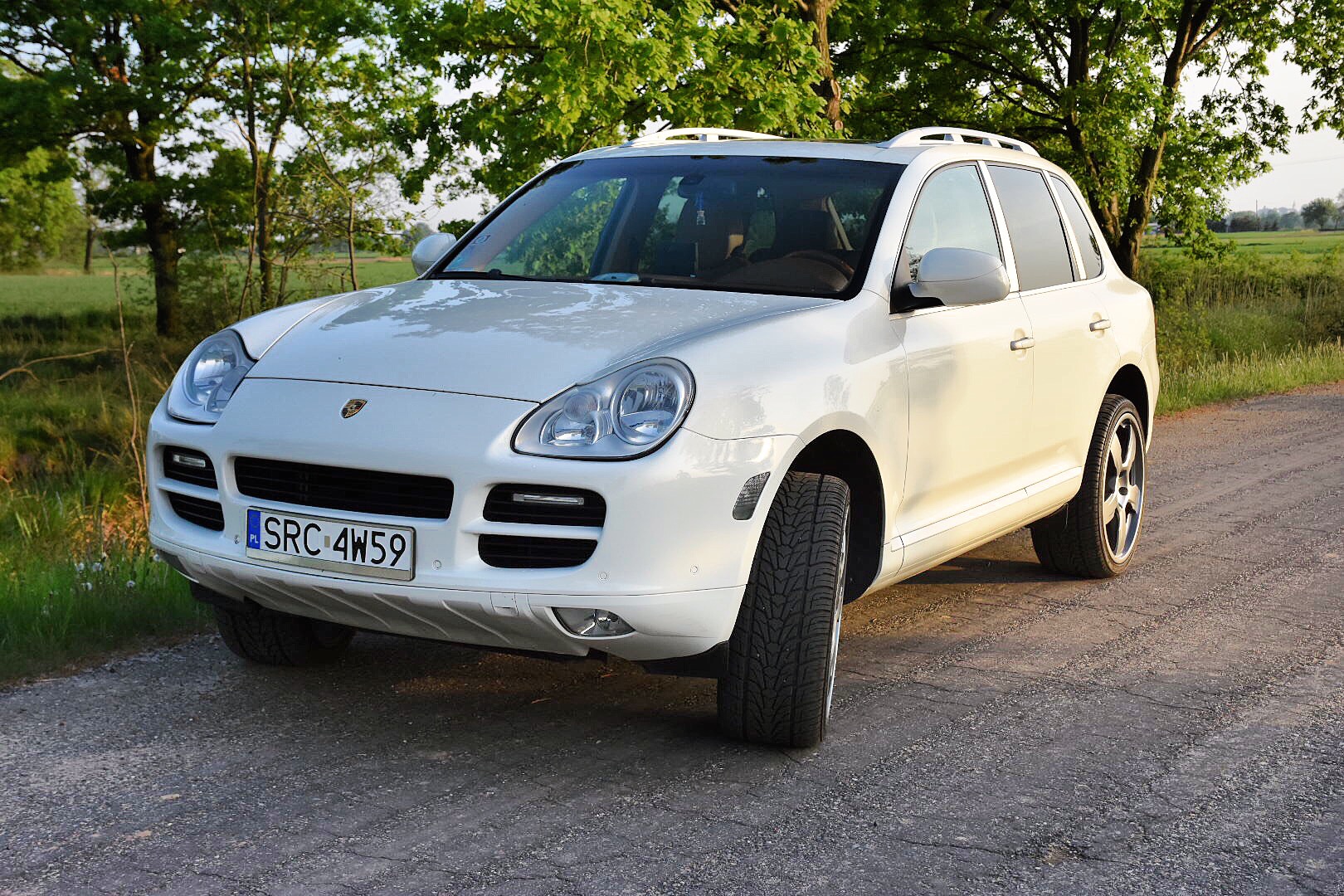 Порш белый 2006