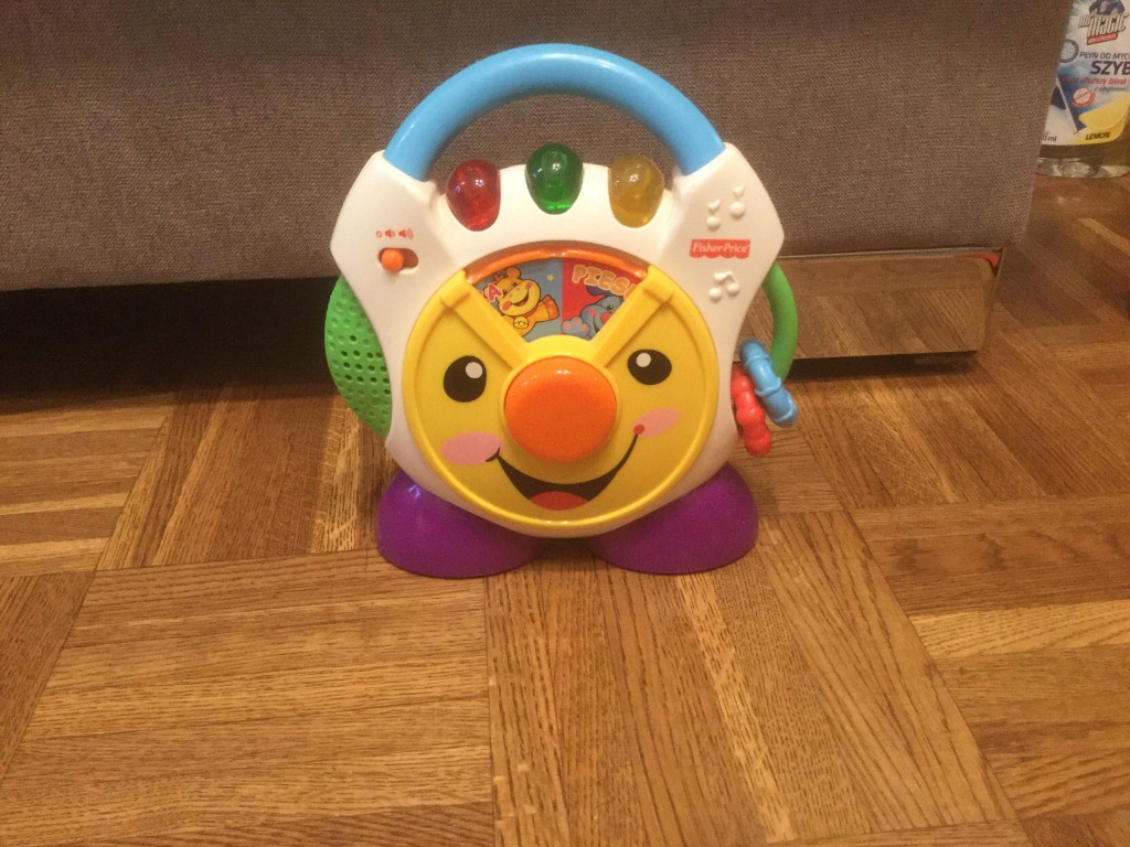 FISHER price ZEGAR grający uczący  nie zniszczone
