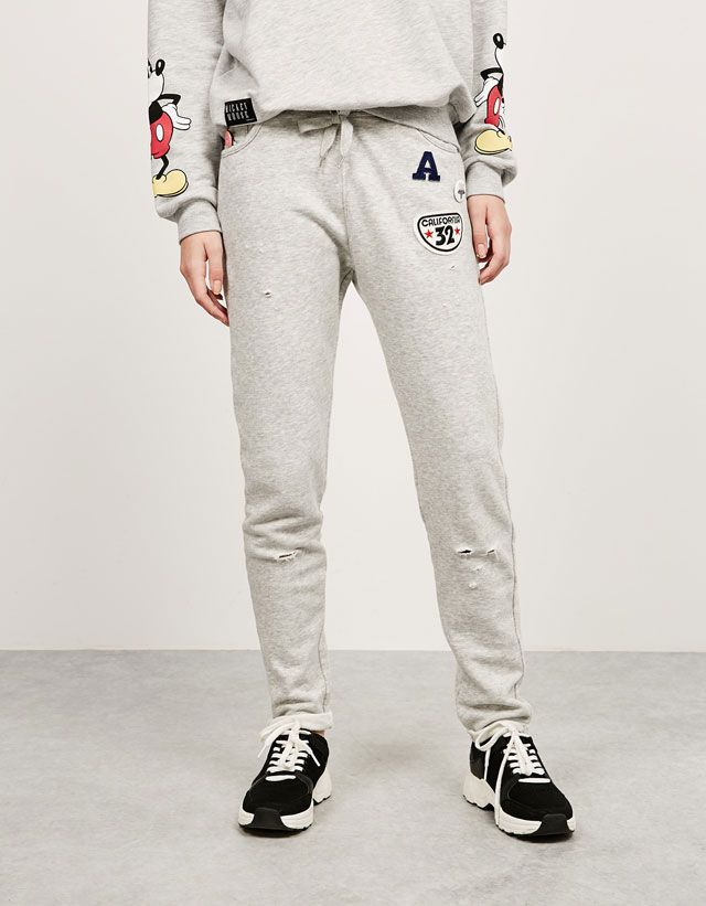 BERSHKA Szare dziurawe dresy naszywki (L)