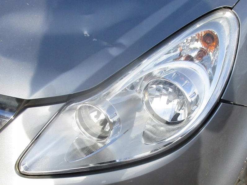OPEL CORSA D LAMPA LEWA PRZEDNIA PRZÓD EUROPA
