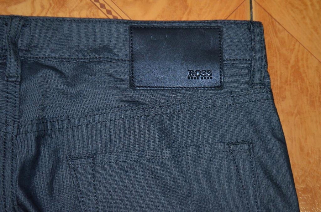 Spodnie HUGO BOSS W34 L30 szare, pas 92cm.