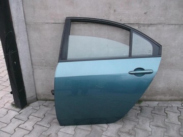 Двері ліві зад nissan primera p12 hb -доставка- фото №1