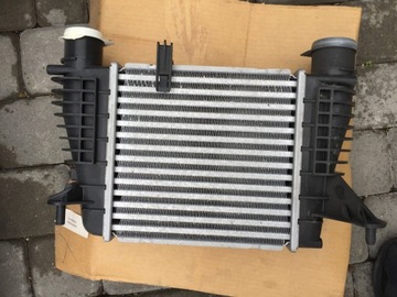 Nissan note e11 intercooler original new, фото