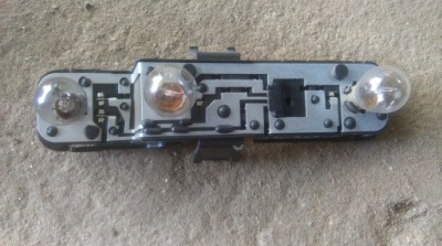 Nissan almera n16 lift вкладиш лампи лівий задня фото №1