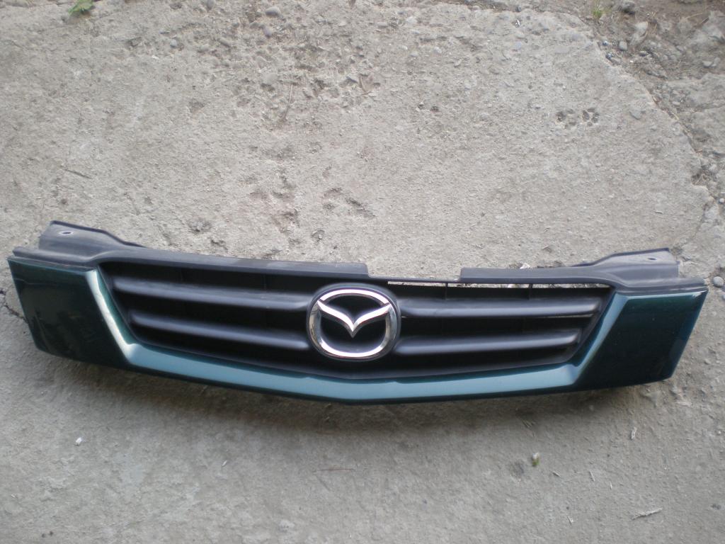фото №1, Решётка радиатора решётка радиатора mazda demio lift оригинал