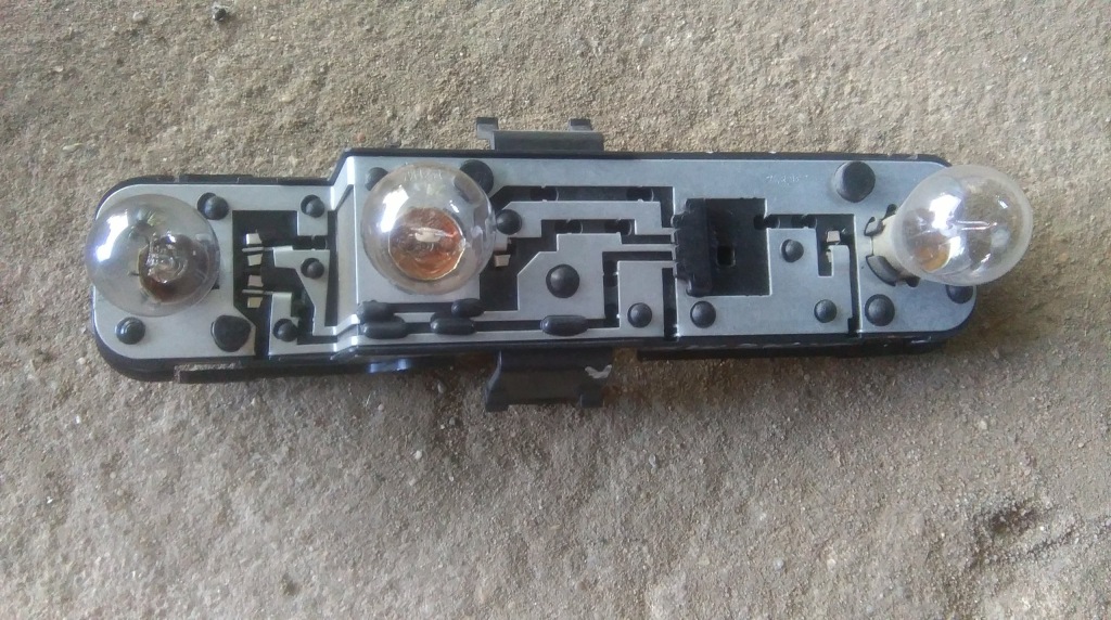 фото №1, Nissan almera n16 lift вкладиш лампи лівий задня