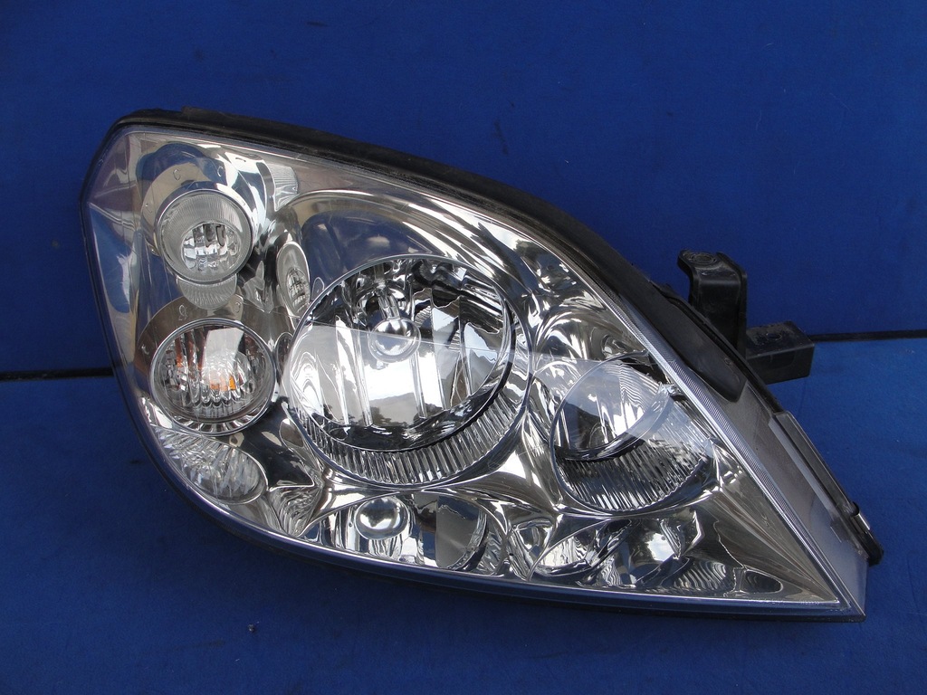 фото №1, Nissan primera p12 02- 2002- фара лампа правая